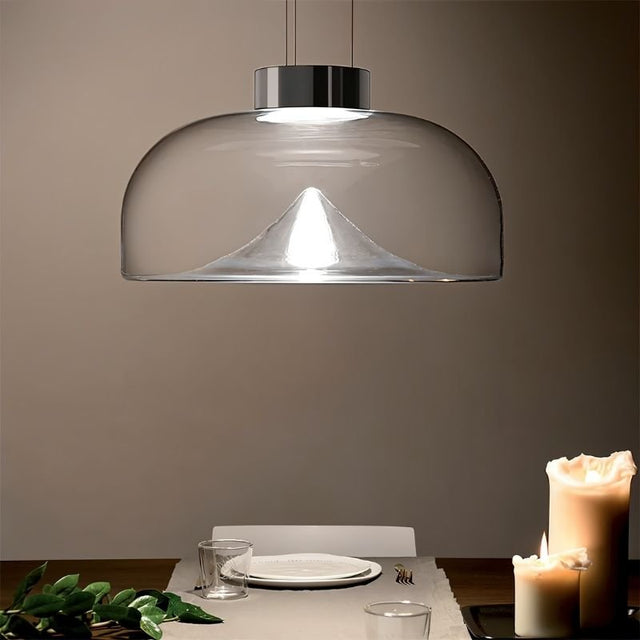 "Glass pendant light with a dome-shaped shade, featuring a refined stone accent, ideal for dining rooms."