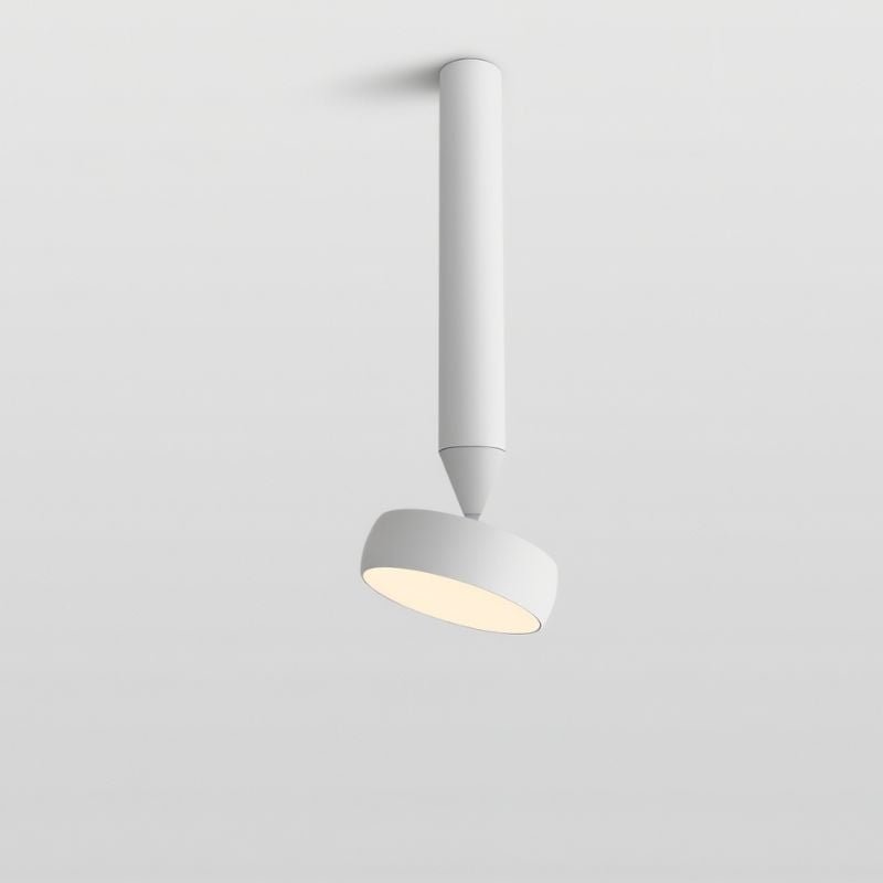 "Single white ceiling light with adjustable head and cylindrical body, aluminum construction, minimalist ceiling-mounted design."