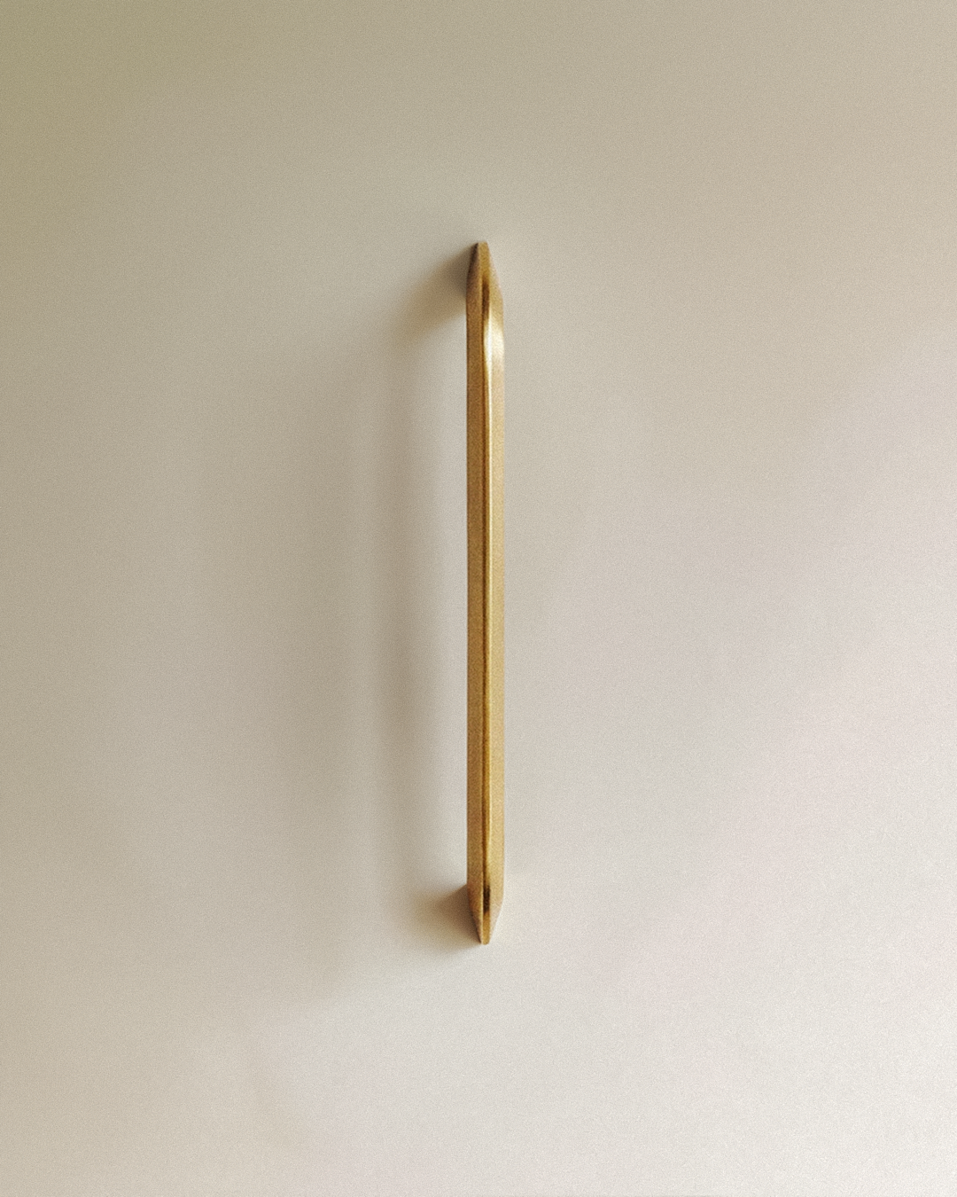 Enzo Cabinet Pull 6" in Unlacquered Brass front view, on a plain background