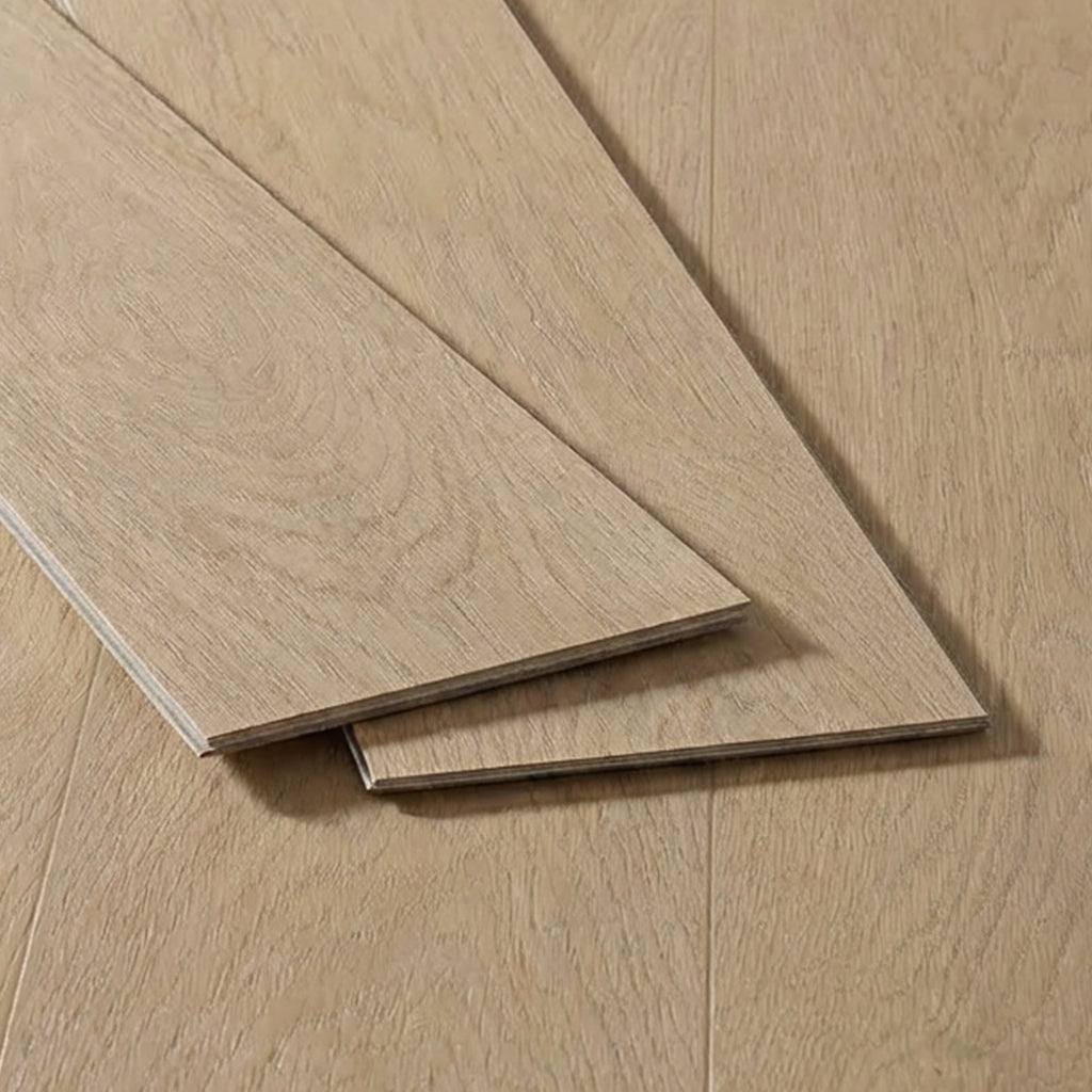 Three planks of light oak wood flooring with a sunwashed finish displayed on a matching installed floor.