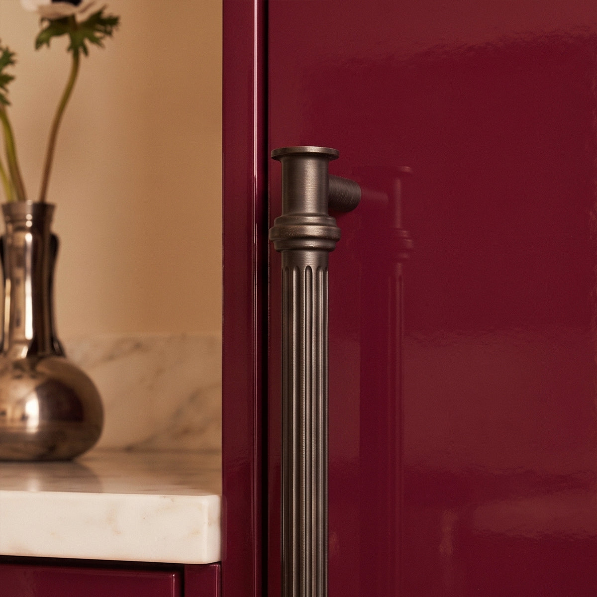 Vestige Cabinet Pull in Satin Brass, styled interior