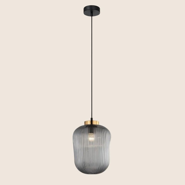"Pendant light with striped glass shade and gold top, offering elegant illumination for modern interiors."