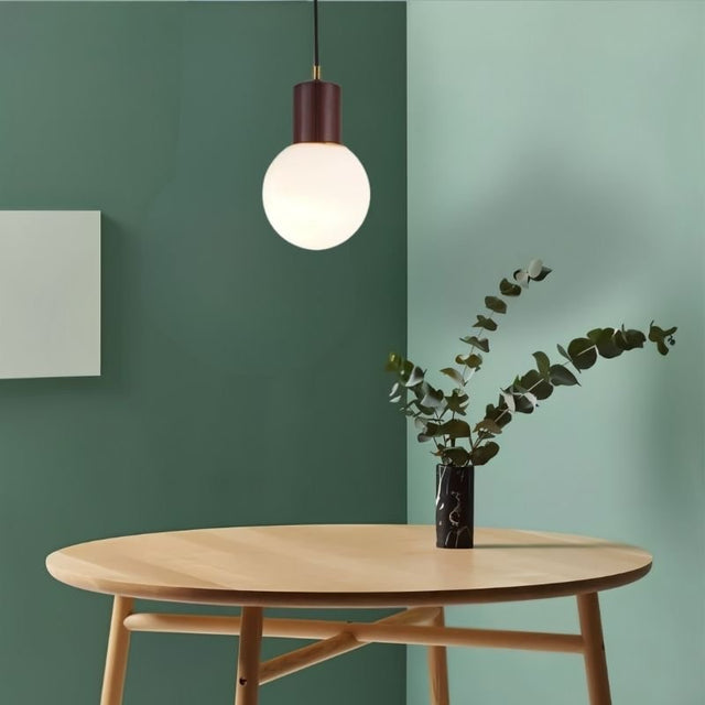 "Minimalist pendant light with wooden holder, blending natural warmth and modern design, perfect for Scandinavian or mid-century interiors."