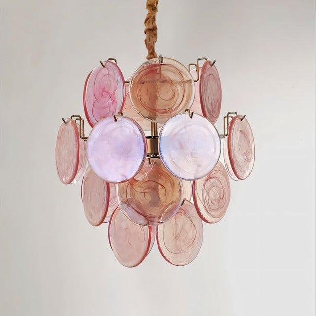 "A Murano glass disc chandelier with varied pink tones."