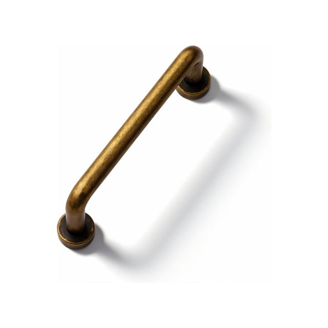"A minimalist antique brass pull bar handle made of durable zinc with a slim, cylindrical design and rounded ends, suitable for cupboards, cabinets, drawers, and wardrobes."