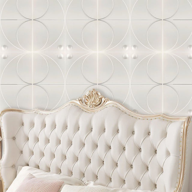 Amili PVC Wall Panels behind a tufted cream headboard, showcasing a modern geometric design ideal for stylish bedroom decor.