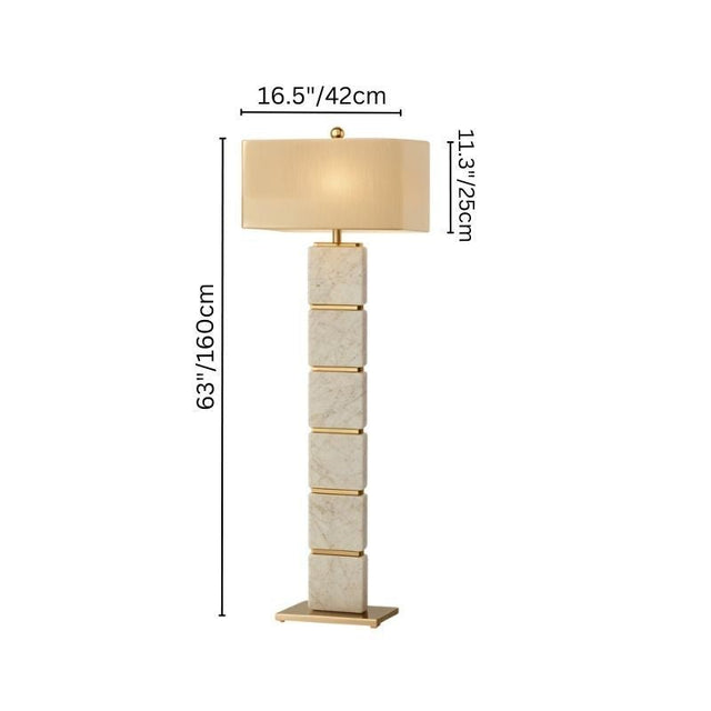 "Modern floor lamp with stacked travertine blocks and gold accents, featuring a rectangular fabric shade. Dimensions: 63” height, 16.5” width, and 11.3” depth."