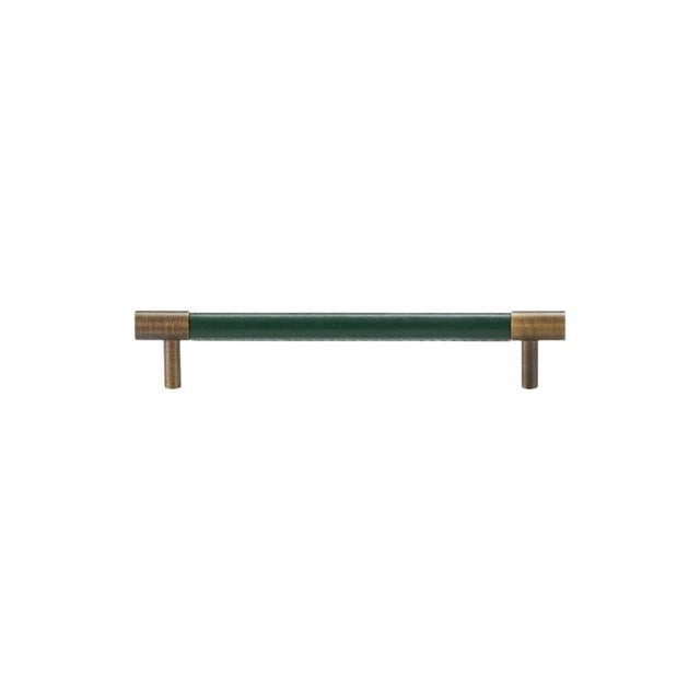 "A modern green leather and brass cabinet pull bar on a white background."
