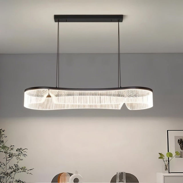 "Minimalist chandelier with a sleek iron frame and undulating acrylic shade, creating a striking focal point in a modern space."