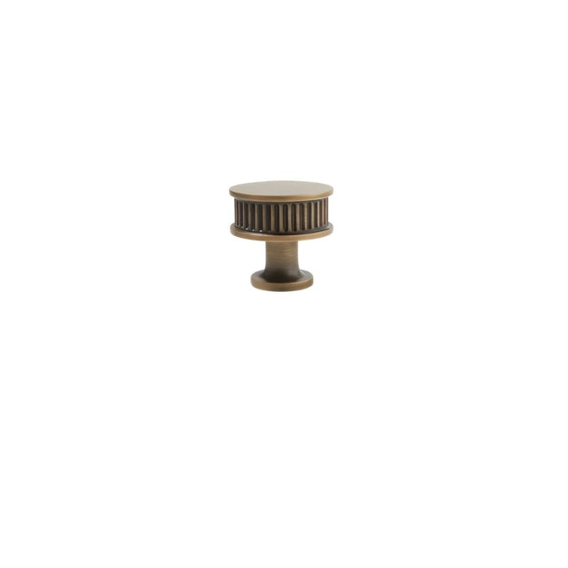 "Brass antique round knob with fluted design"