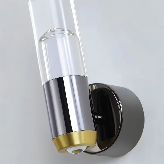 "Close-up detail of a modern wall lamp with a cylindrical acrylic diffuser and a sleek metal base."