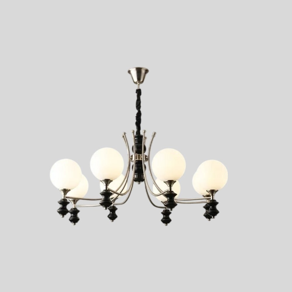 "Modern chandelier with six frosted glass globes, curved arms, and black detailing, isolated on a white background."