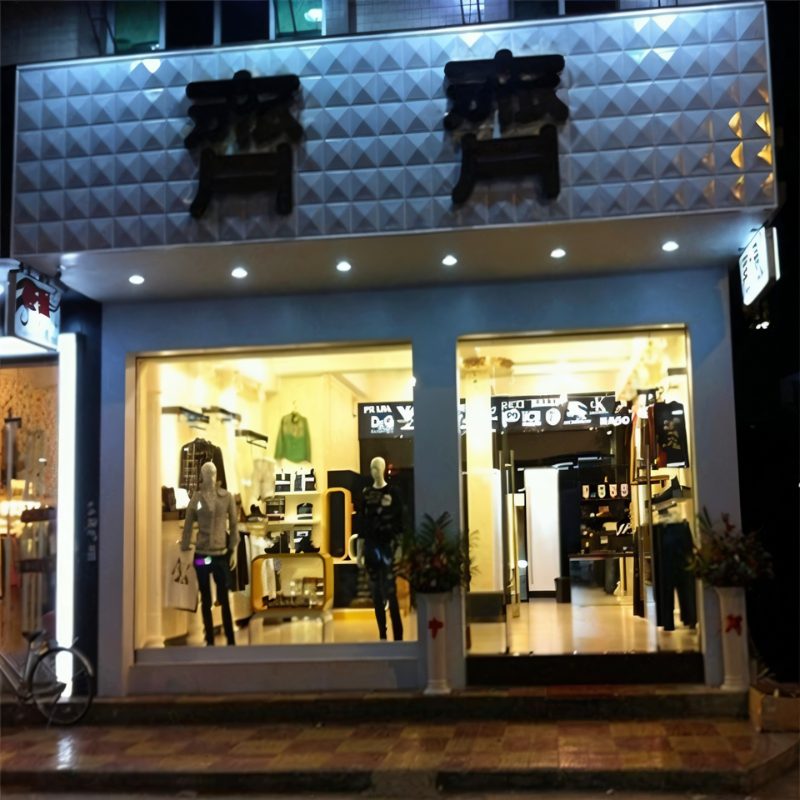 Badra Wall Panel - Stylish 3D Outdoor Wall Panels for Modern Spaces applied to a retail storefront exterior, adding a contemporary and eye-catching facade.