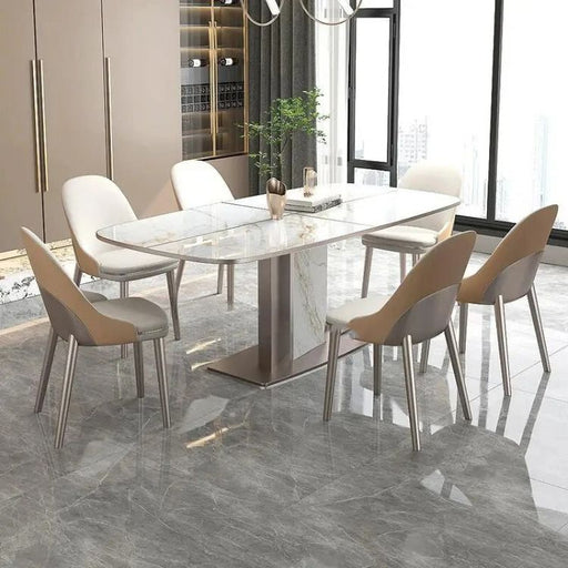 The Bethna Dining Table exudes elegance and sophistication with its sleek design and impeccable craftsmanship.