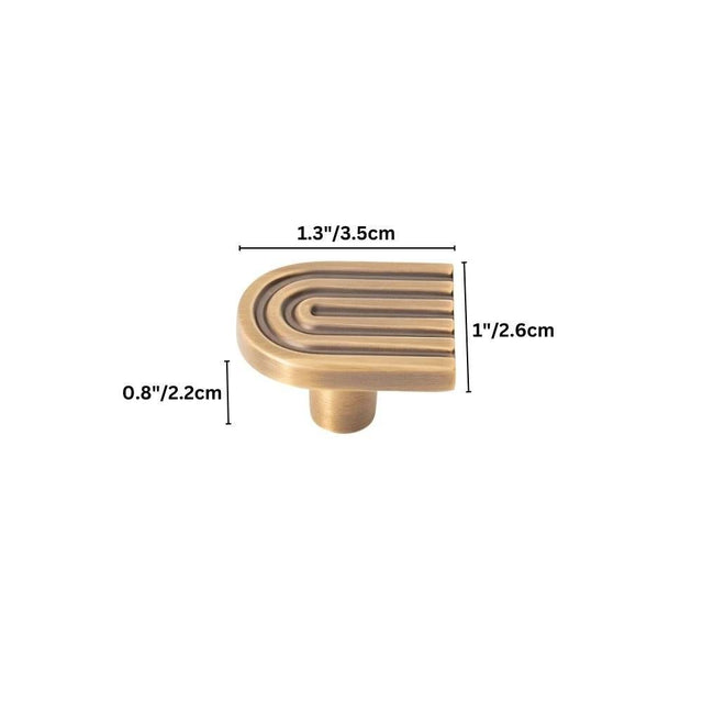 "Brass Art Deco knob with rounded edges and parallel lines."