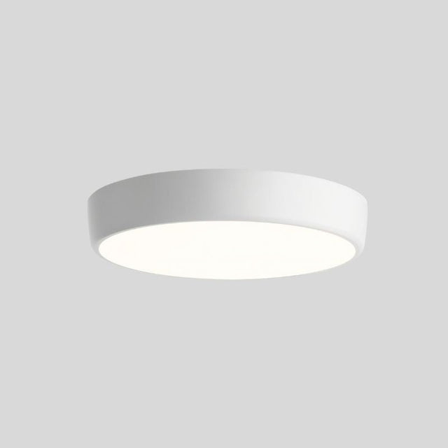 "Clean white ceiling light with a simple, elegant design, offering seamless integration in any modern room"