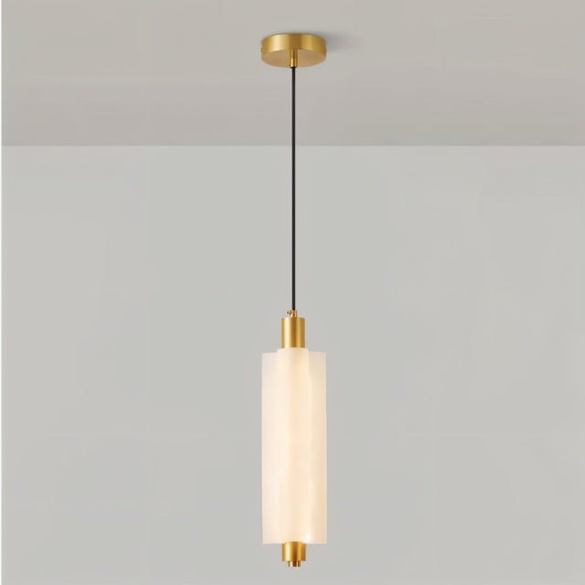 "A single-tiered, minimalist pendant light with a frosted acrylic cylinder and brass accents, hanging from a black cord."