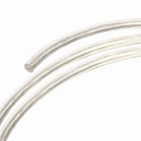 Silver braided cable coiled in curves against white background.
