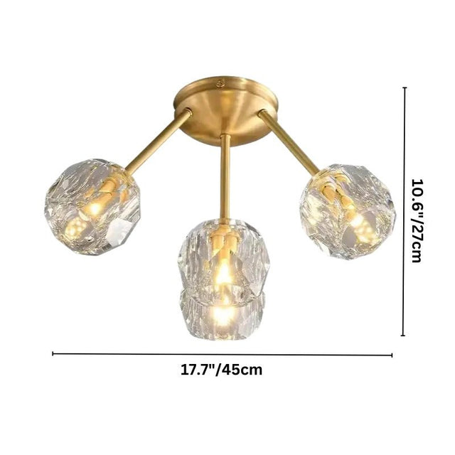 "Modern 4-light ceiling fixture with crystal shades and brass finish, showing dimensions of 10.6 inches and 17.7 inches."