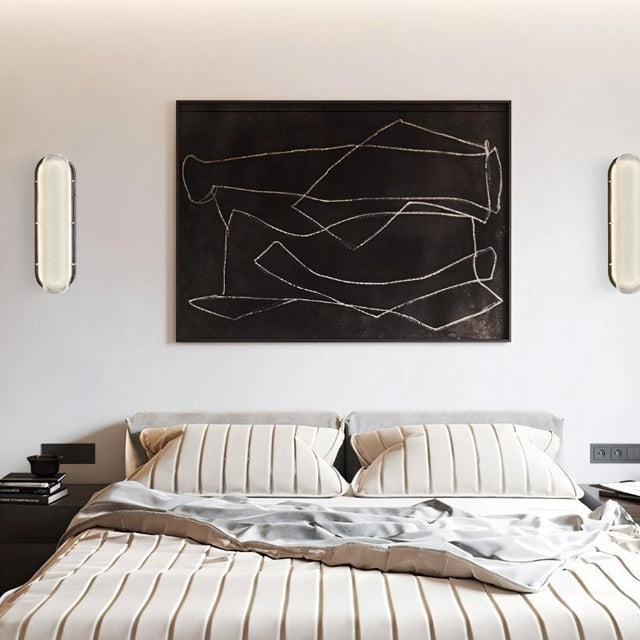 "Pair of modern elongated wall lamps with textured acrylic diffusers flanking a large painting above a bed."