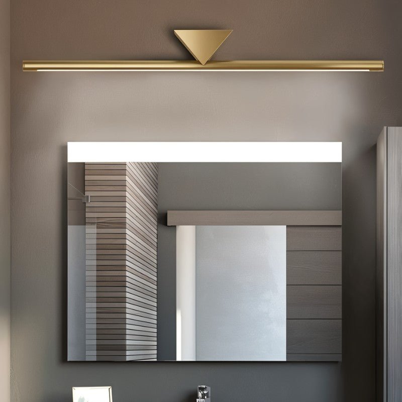 "A modern, linear LED wall lamp with a geometric accent illuminating a bathroom mirror."