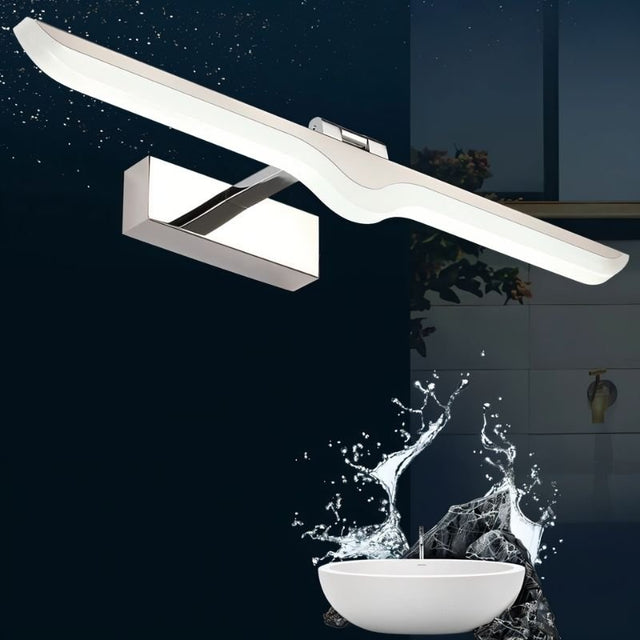 "A modern LED vanity light with a chrome finish mounted above a sink, showcasing its sleek design and balanced illumination in a contemporary bathroom setting."