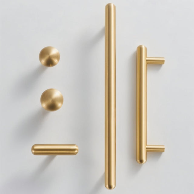 "Modern minimalist brushed brass knobs and pull bars for contemporary kitchen or bathroom cabinets."