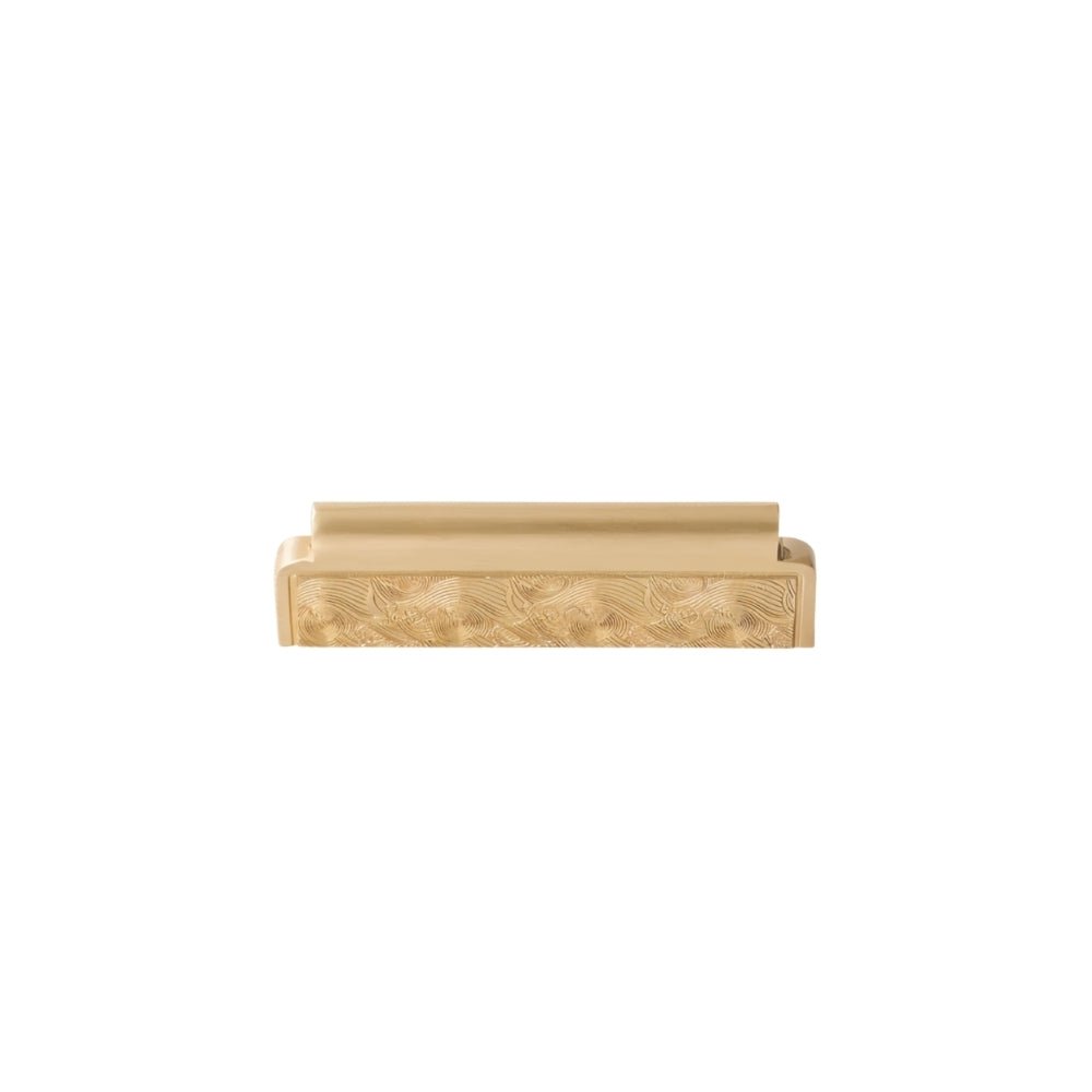"A long, textured brass Erdas pull bar handle on a white background."