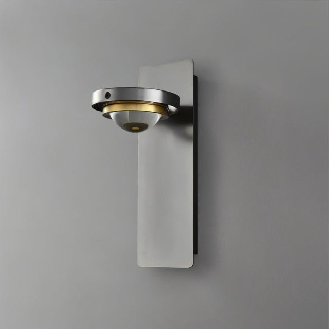 "A modern gunmetal wall lamp with an adjustable light and glass lens, shown against a gray background."