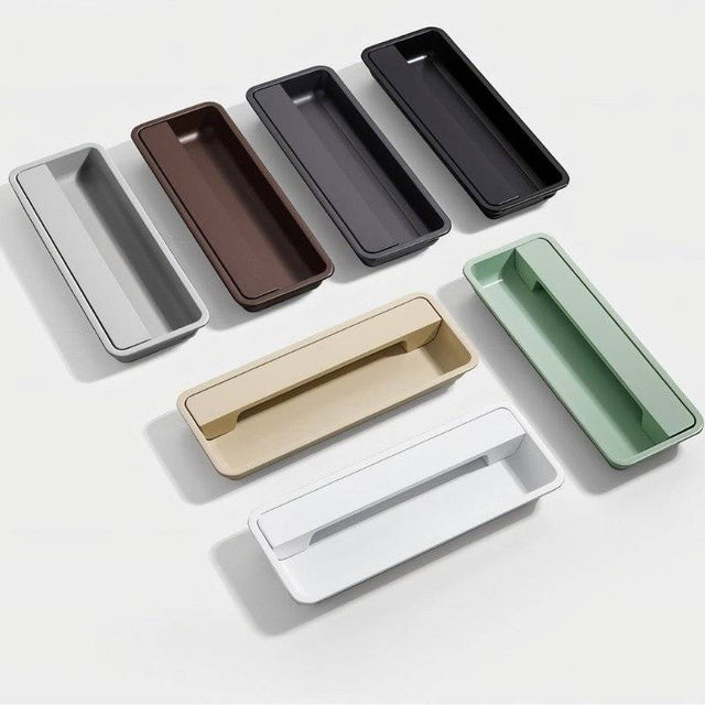 "Rectangular recessed drawer pulls in various colors, made of aluminum alloy, showcasing a minimalist design."