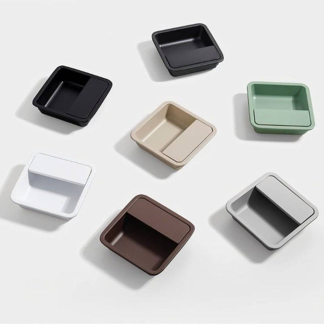 "Square recessed drawer pulls in multiple colors, made of aluminum alloy, showcasing a minimalist design."