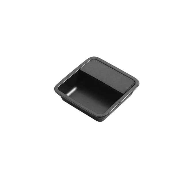 "Black aluminum recessed drawer pull with a minimalist design, isolated on a white background."
