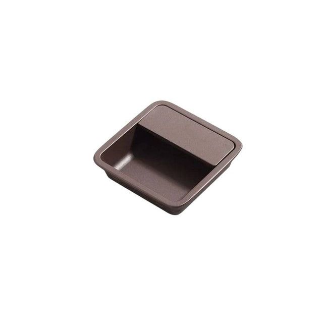"Brown aluminum recessed drawer pull with a minimalist design, isolated on a white background."