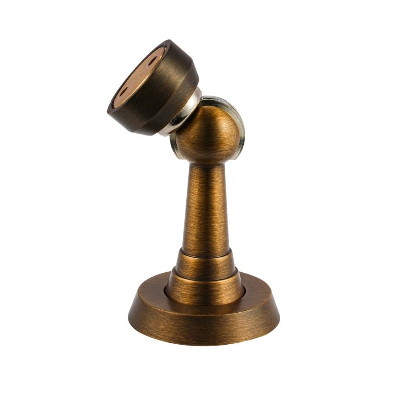 "Bronze magnetic door stop with a tilted head, isolated on a white background."
