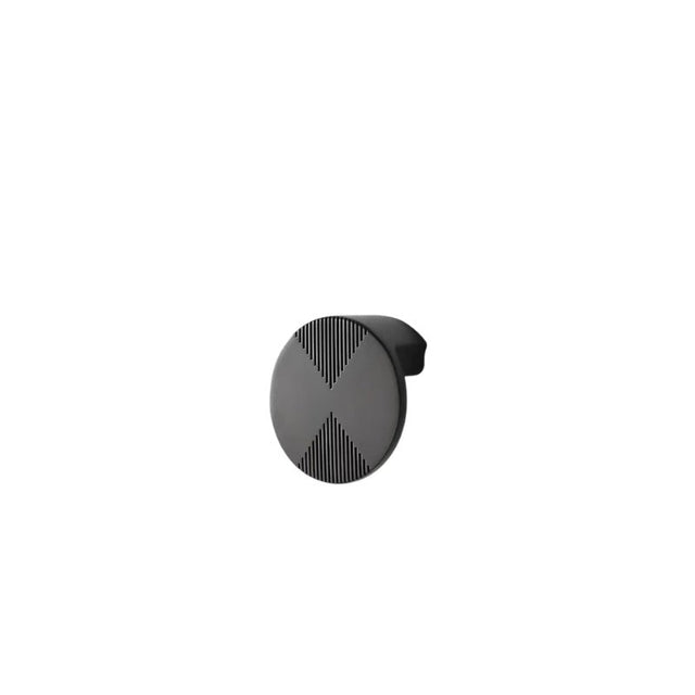 "Gunmetal cabinet knob with a bold circular design and etched geometric detailing, isolated on a white background."