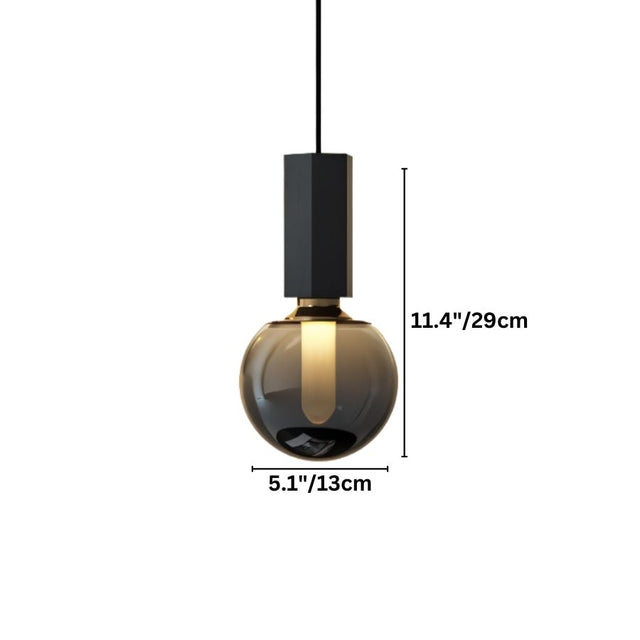 "Dimensions of a modern pendant light with a concrete rectangular top, metal accent, and smoky glass orb: 11.4 inches in height and 5.1 inches in diameter."