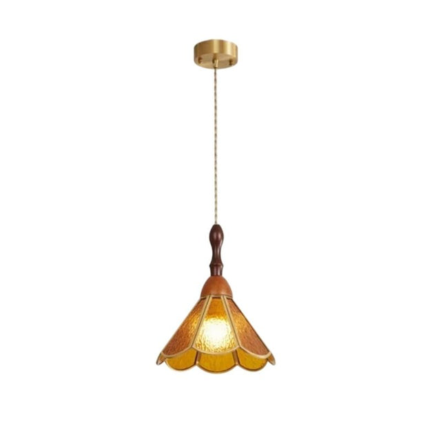 "Handcrafted pendant light with amber stained glass panels and a copper framework, creating a warm ambient glow."