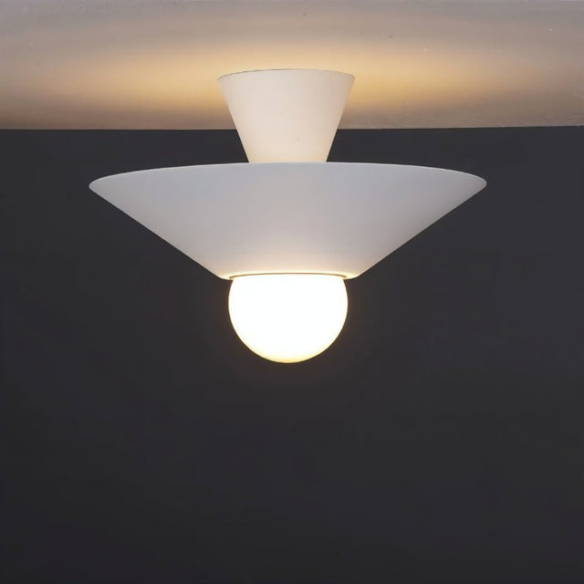 "Close-up of the Glome Ceiling Lamp with a white finish and geometric design, showcasing its central globe bulb for soft ambient light, perfect for contemporary settings."