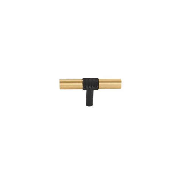 "Modern brushed gold and black knob with a cylindrical design and knurled detailing."