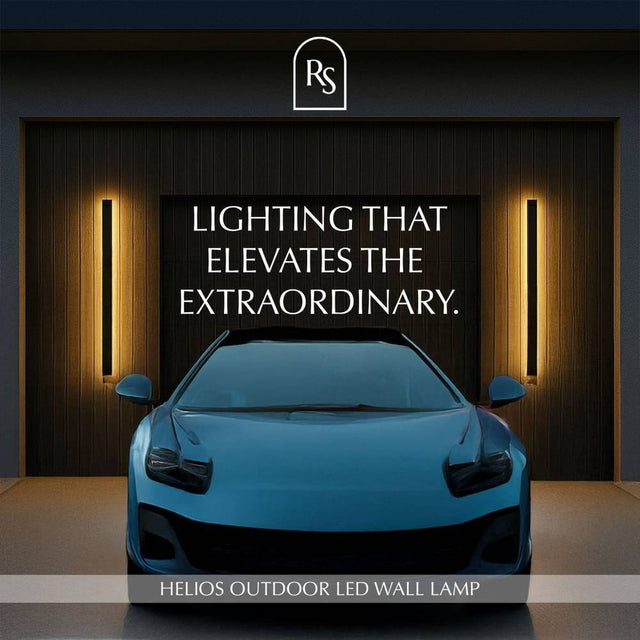 Helios LED Outdoor Wall Lamps flanking a garage, delivering sophisticated lighting that elevates curb appeal.