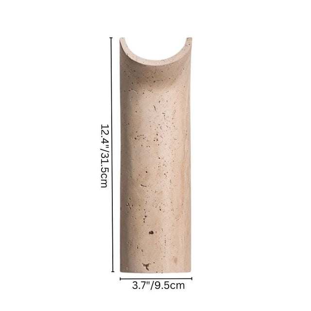 "Ilana travertine wall lamp, showcasing its curved design and compact dimensions (12.4"/31.5cm height, 3.7"/9.5cm depth)."