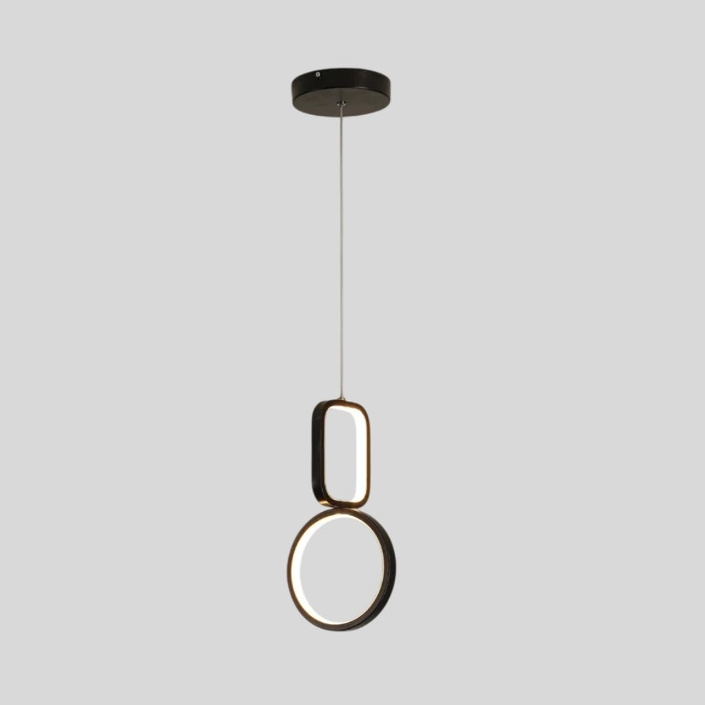 "Geometric pendant light with dark metal frame and acrylic diffusers, featuring circular and rectangular shapes, isolated on a light gray background."