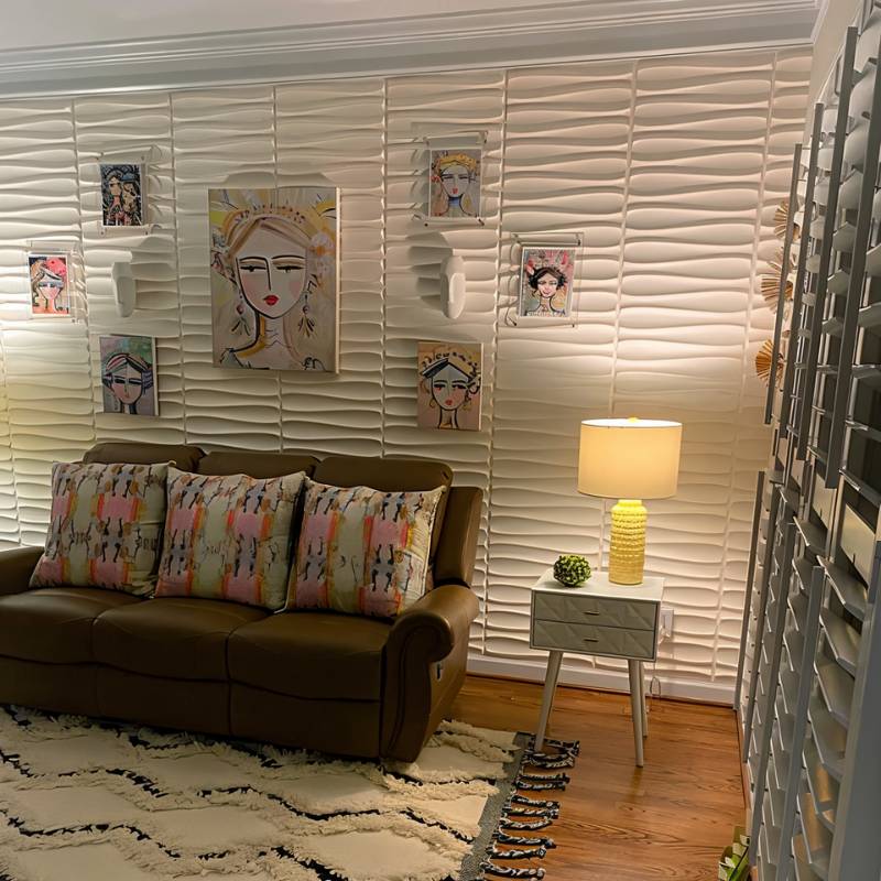 Kerso Wall Panel used in a cozy living room setup, featuring 3D wave patterns that add depth and artistic flair to the interior.