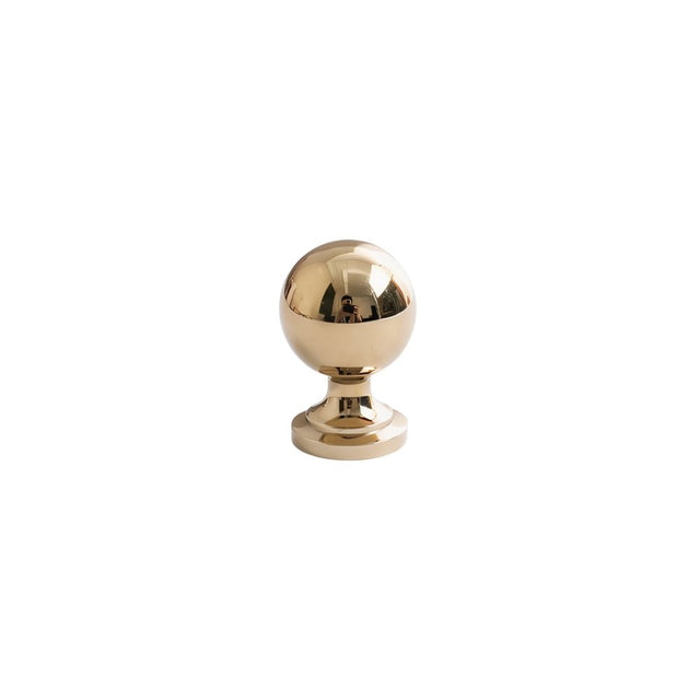 "Brass round ball knob with a classic design on a white background."