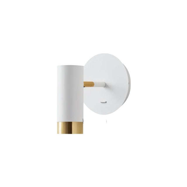 "A white wall lamp with a round base and a cylindrical shade, shown against a white background."
