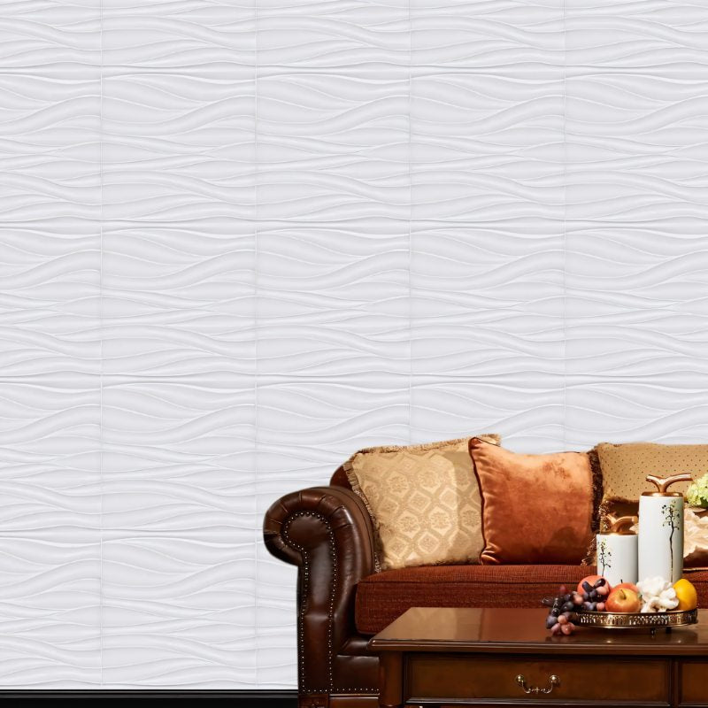 Lavic 3D wavy wall panels featured in a cozy living room with a brown leather sofa, enhancing the space with a stylish, modern touch.