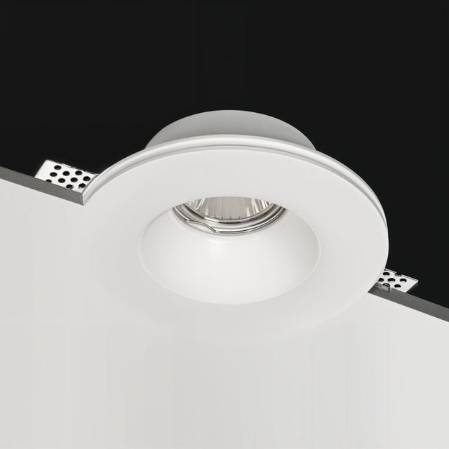 "Close-up of Loux Trimless Downlight, featuring a minimalist design made of gypsum and aluminum, seamlessly integrated into the ceiling for a clean, unobtrusive look."