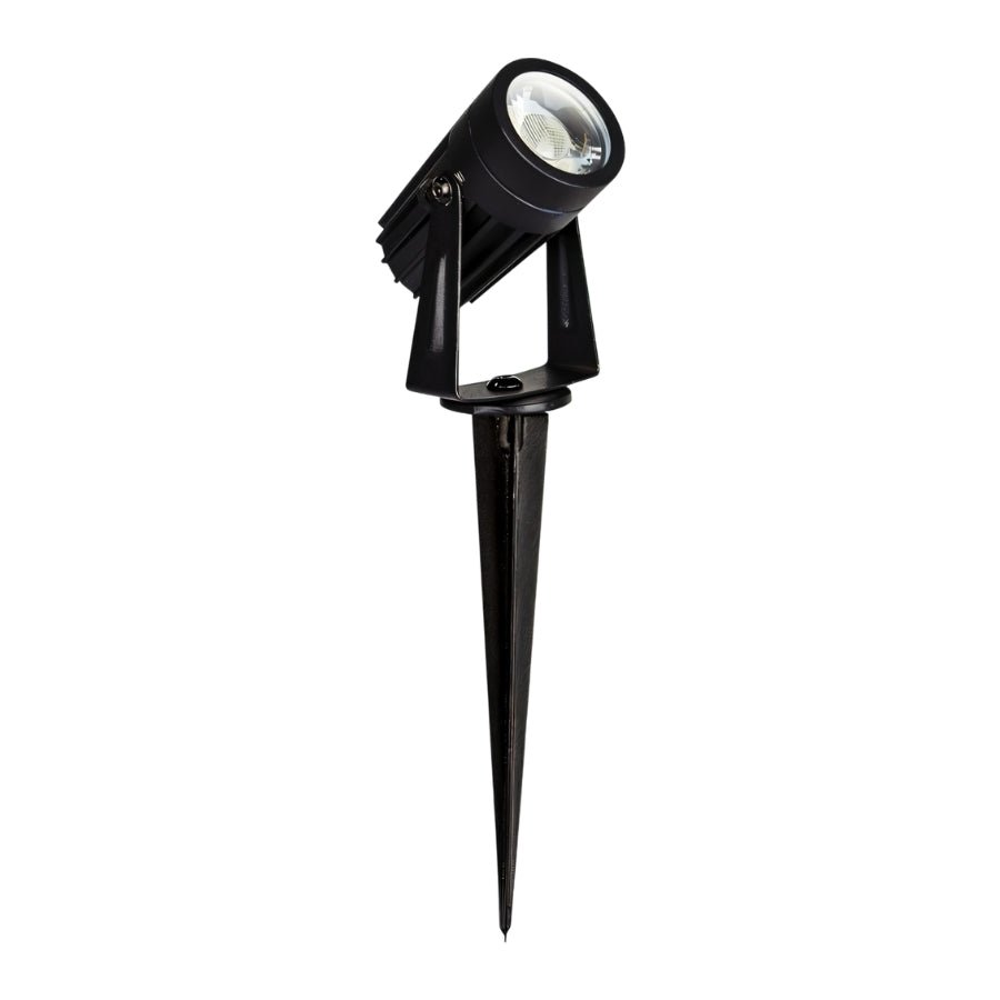 "Outdoor spotlight with spike mount, aluminum body, glass diffuser, and adjustable head."