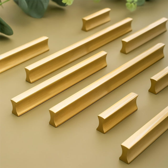 "Sleek geometric brass pull bars with a brushed finish for modern minimalist cabinets."