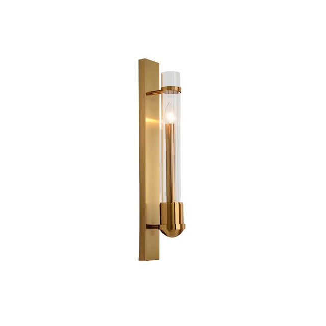 "A modern brass wall lamp with a rectangular base and a cylindrical glass shade, shown against a white background."